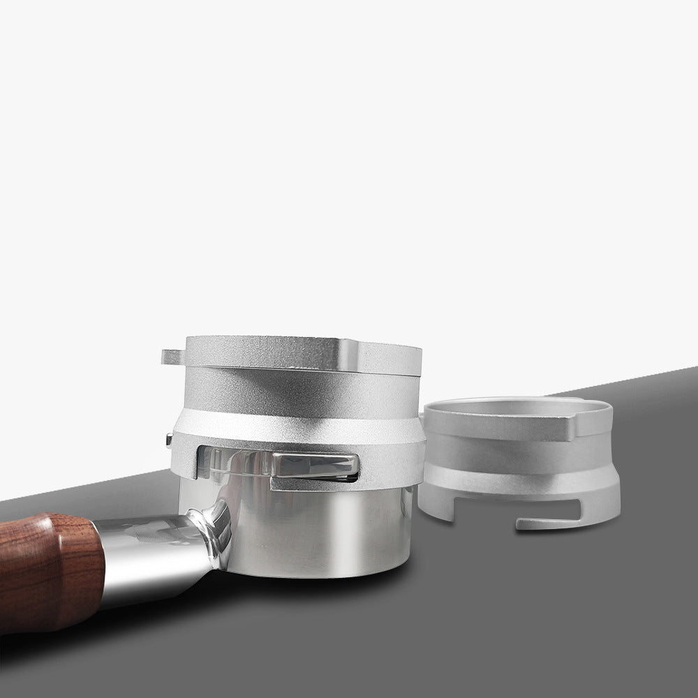 Silver 54mm twist-lock dosing funnel fitted to a compatible Breville portafilter - Grind Logic