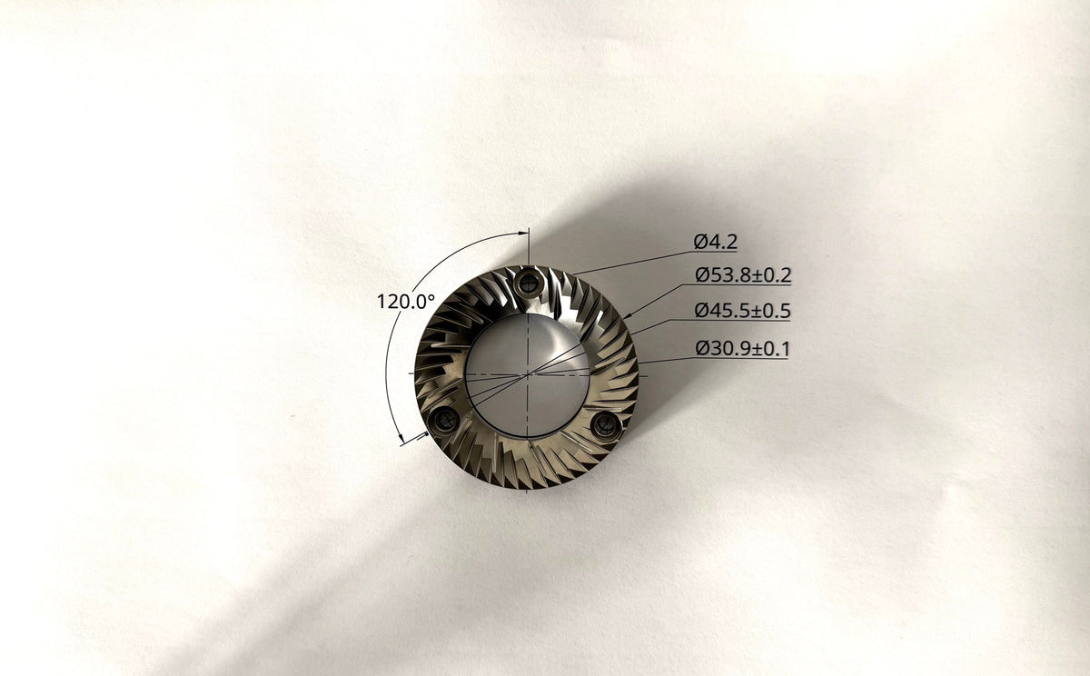 54mm flat coffee grinder burr placed over a technical drawing showing burr geometry and dimensions - Grind Logic