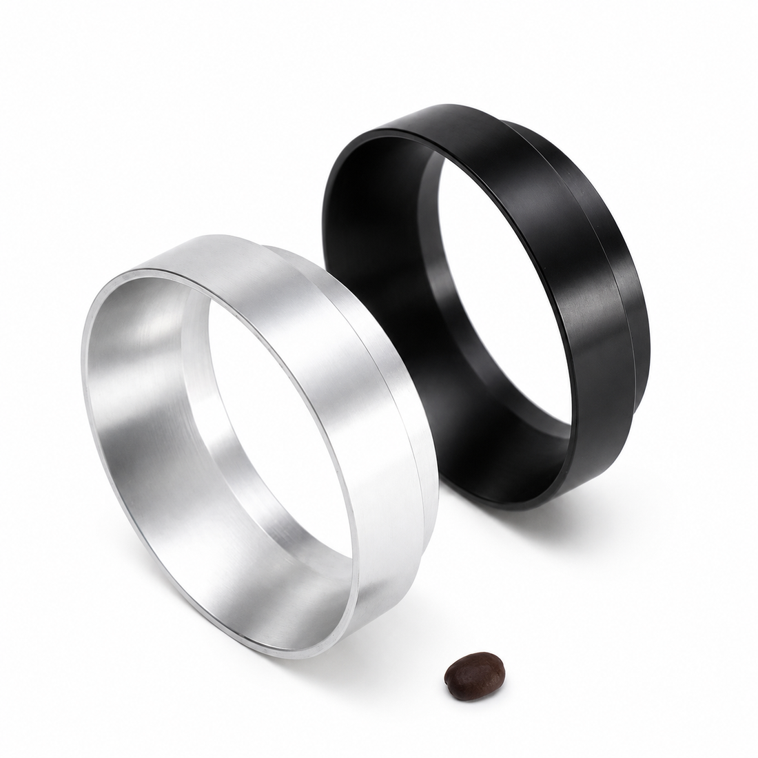 Grind Logic black and silver magnetic portafilter dosing funnels on a white background