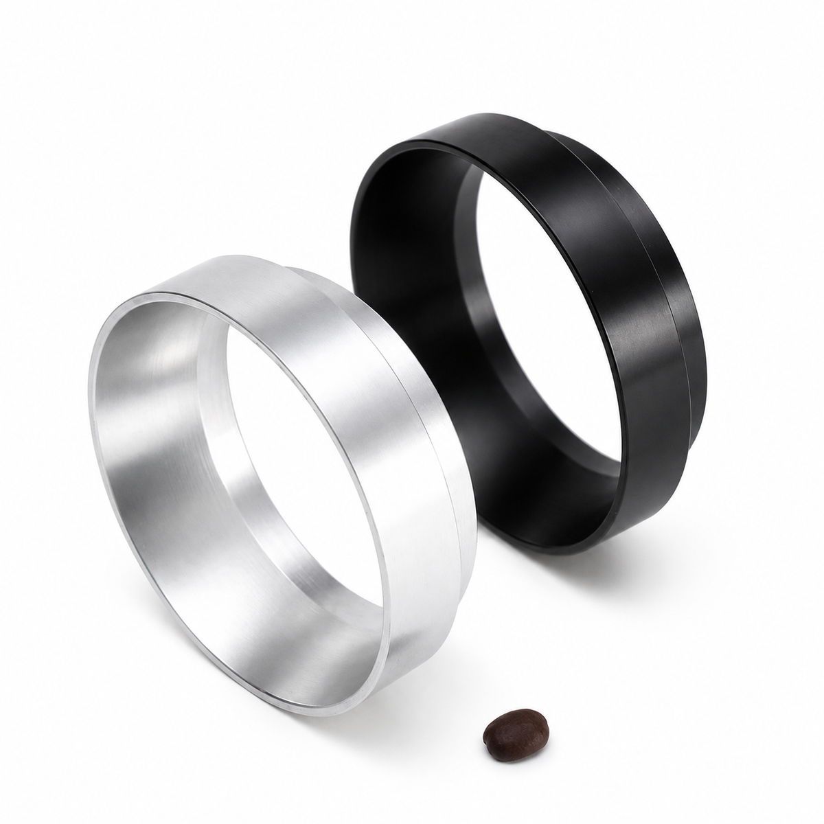 Grind Logic black and silver magnetic portafilter dosing funnels on a white background